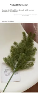 Detailed close-up of dark green PE artificial fir branch for Christmas decoration
