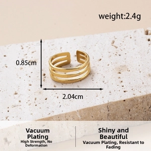 Macro shot showing 0.85cm width and 2.4g weight of the gold triple layer ring
