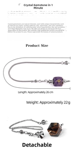 Detail view of Cho Ku Rei crystal pendulum showing 26cm size and detachable metal chain