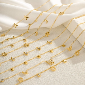 Minimalist gold plated stainless steel bracelets with butterfly, moon and star charms