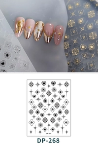 Macro detail of DP-268 3D relief nail art stickers with gold heart and star patterns