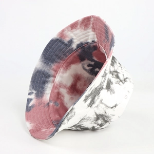 Detailed view of tie-dye bucket hat showing thick twill fabric texture and stitching