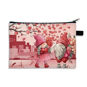 Detail of pink fabric makeup bag featuring a cute cartoon gnome valentine illustration