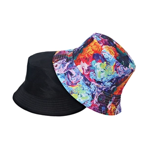Double-sided bucket hat with classic solid black and colorful rainbow tie-dye ink patterns