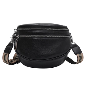 Black pebble leather crossbody chest bag with striped wide strap and dual zippers