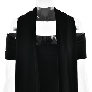 Close-up of black ruched knit fabric texture and elegant draped neckline detail