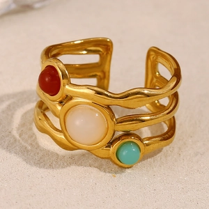 Detail of 18K gold-plated double-layer ring with red, white, and turquoise zircon stones