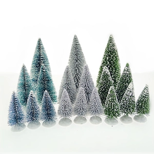 Miniature Christmas trees in green, blue and white for festive tabletop decoration