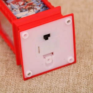 Detail view of Christmas lantern base with battery compartment, ON/OFF switch and CE mark