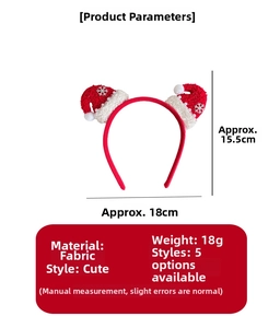 Detailed view of red Christmas headband featuring mini Santa hats and snowflake patterns