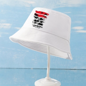Détail de l'imprimé Sunset Beach avec palmiers sur un chapeau bob en coton blanc