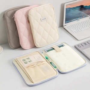 Quilted 11 inch tablet sleeve in grey, pink and beige with protective multi-layer interior