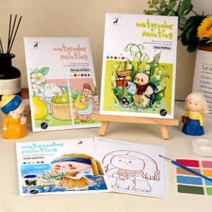 Detail of DIY watercolor painting set with brushes and harvest orchard themed books