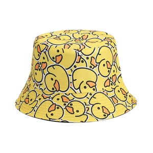 Yellow bucket hat with all-over duck pattern for outdoor sun protection and travel