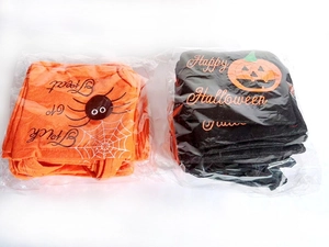 Bulk pack of Halloween non-woven gift bags with orange pumpkin and black spider prints