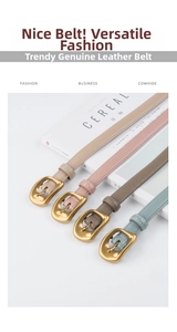 Close-up of slim cowhide leather belts with matte gold buckles in various colors