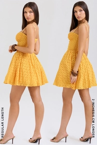 Detail view comparing regular and 5cm longer length of yellow lace mini dress