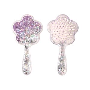 Cute flower shaped air cushion hairbrush with glitter sequins and purple massage bristles