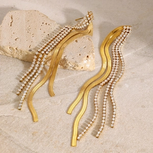 Elegant gold-tone stainless steel tassel earrings with sparkling rhinestones on stone