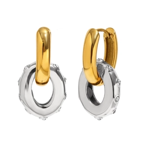Two-tone 18K gold and silver plated stainless steel oval hoop earrings on white background