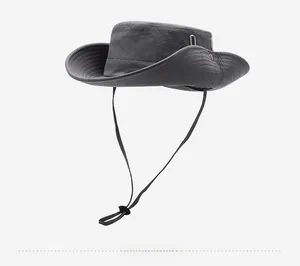 Detail of dark grey sun hat featuring reinforced wide brim and adjustable chin strap