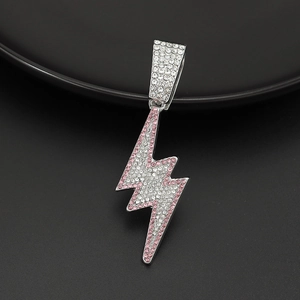 Hip hop lightning bolt pendant with white and pink rhinestones on dark background