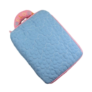 Quilted floral laptop sleeve in sky blue with pink melody embroidery and handles