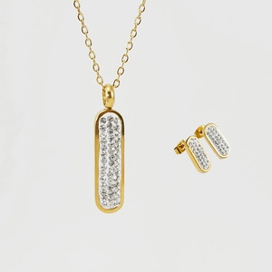 Parure de bijoux dorés avec collier et boucles d'oreilles sertis de cristaux brillants