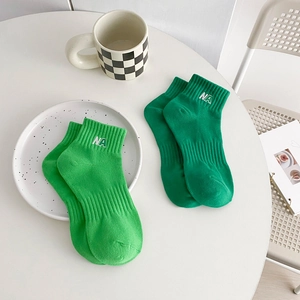 Two pairs of green Japanese ins style cotton ankle socks with white NA letter embroidery