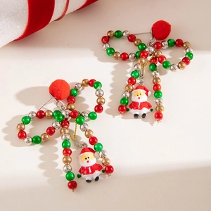 Christmas bow earrings with colorful beads, fluffy red pom-pom and Santa Claus pendant