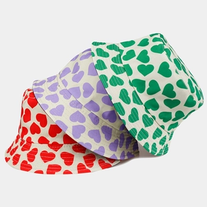 Three-color bucket hats with double-sided heart prints in red, purple, and green cotton