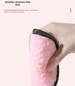Close-up of thick pink microfiber facial puff showing soft texture and premium binding