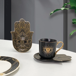 Black and gold ceramic Turkish coffee cup set with Hamsa hand saucer and eye pattern