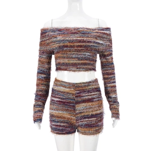 Detail of multi-colored striped knit set featuring an off-shoulder top and matching shorts