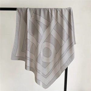 Elegant 90x90cm silk square scarf featuring black and white stripes and letter patterns
