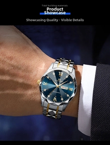 Detail of blue sunray dial watch with date-day display and faceted tri-tone steel band