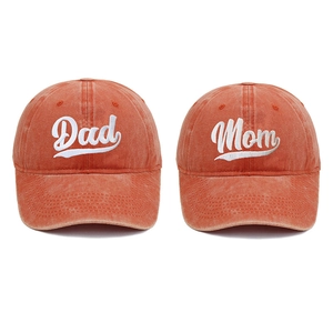 Close-up of Dad and Mom embroidered text on vintage washed cotton baseball caps