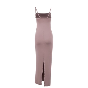 Detailed back view of a slim-fit mauve maxi dress featuring a stylish rear slit design