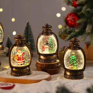Christmas lantern snow globe with Santa and snowman in vintage bronze finish decoration