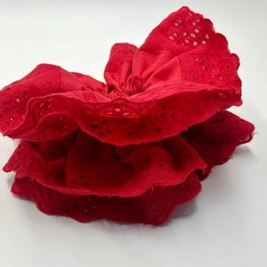 Detail of four-layer lace craft on a vibrant red high-elasticity hair scrunchie