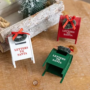 Three mini Christmas mailbox ornaments in red white green with letters to Santa