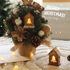 Lighted wooden house Christmas decoration set with mini tree and natural pinecones