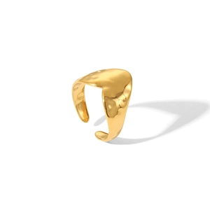 Detailed close-up of golden irregular lava texture on an adjustable open ring