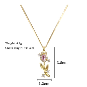 Detailed dimensions of the gold tulip necklace featuring pink gemstone and diamonds