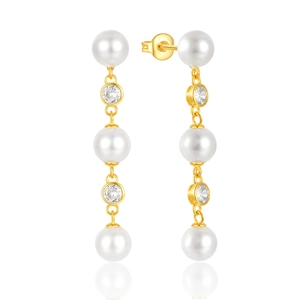 Macro detail of S925 silver long tassel earrings with white pearls and sparkling zircons