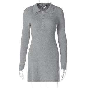 Close-up of grey knit dress featuring a polo collar, button placket, and ribbed texture