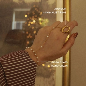 Minimalist gold slave bracelet with pearl hand chain and matching ring for women