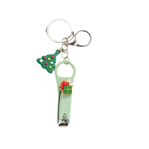 Christmas Santa nail clipper keychain with green holiday tree and cute rabbit charms