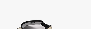 Detail of beige sun visor with black trim showing inner sweatband and brand woven label