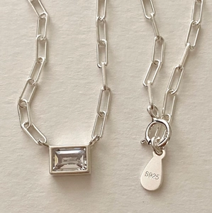 925 sterling silver necklace featuring a square clear zircon pendant on a paperclip chain